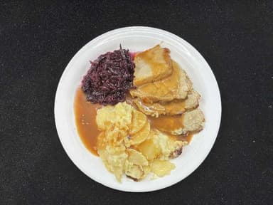 Marineraður grísahnakki með gratín kartöflum og dijonsósu