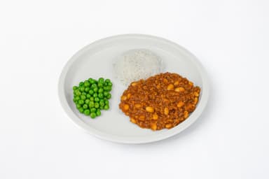 Chili con carne, jasminris, créme fraicheklick, ärter, Fruktsallad