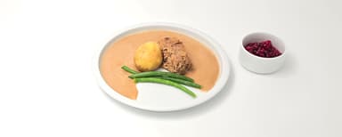 Kålpudding, gräddsås, potatis, glacerade haricots verts, rårörda lingon. Bärkräm